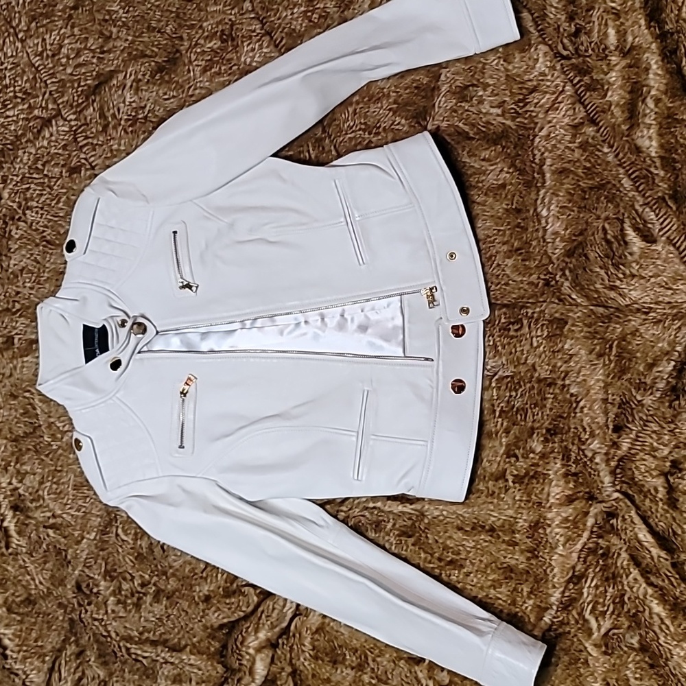 White leather jacket with gold accents